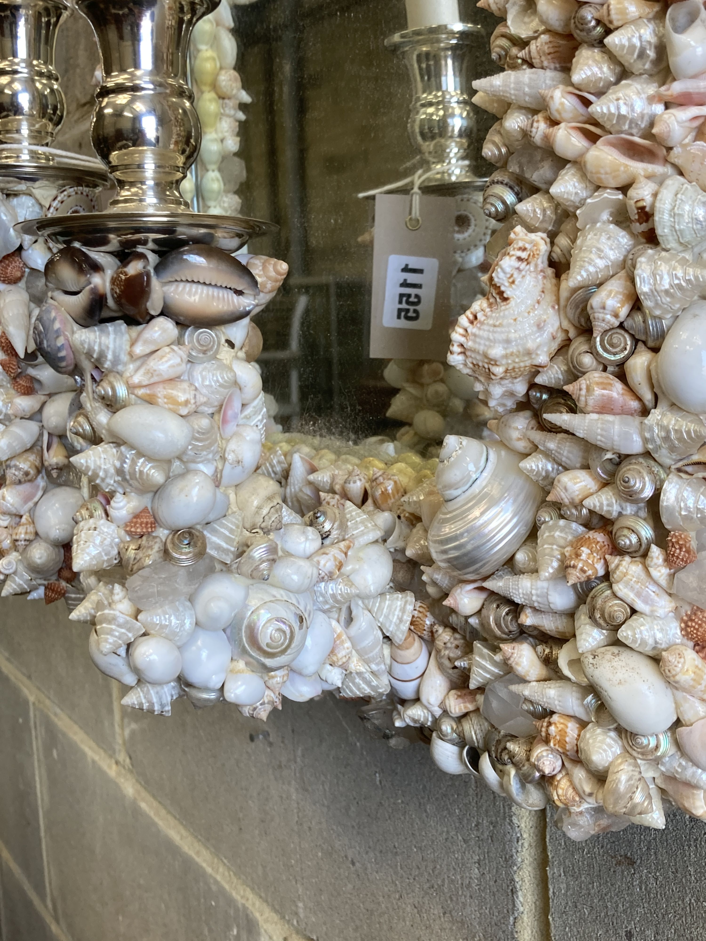 A pair of contemporary shell encrusted two-branch electric girandoles, width 39cm, height 64cm